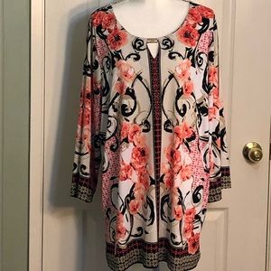 JM woman multi color floral blouse.